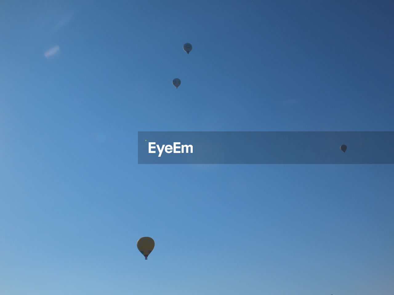 LOW ANGLE VIEW OF HOT AIR BALLOONS AGAINST SKY