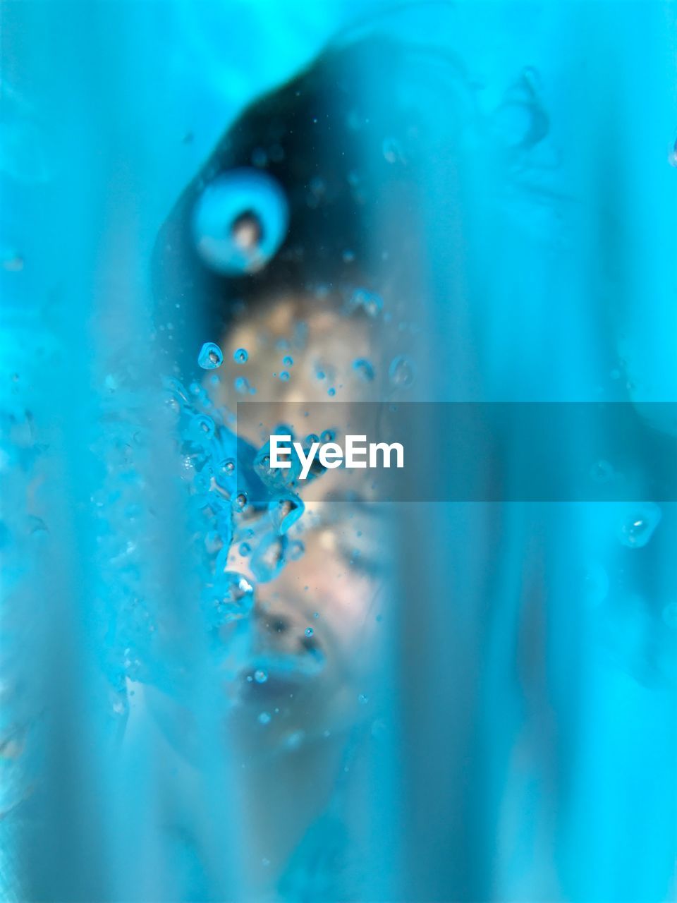 Close-up of woman swimming in pool