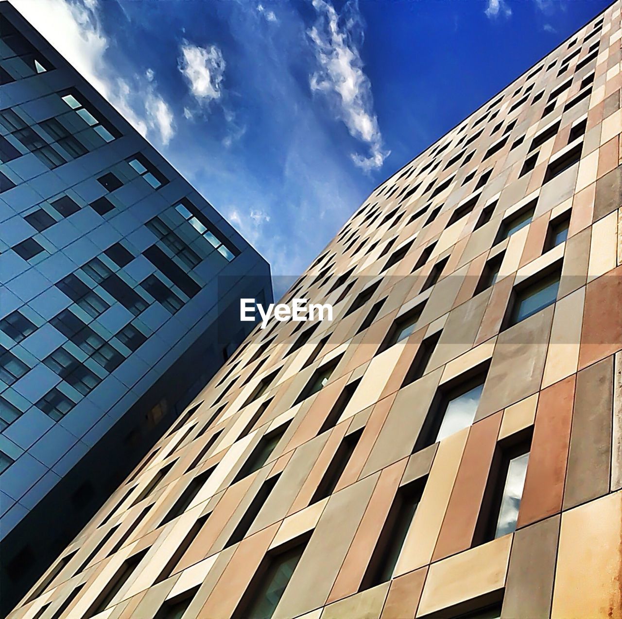 Low angle view of modern building against sky