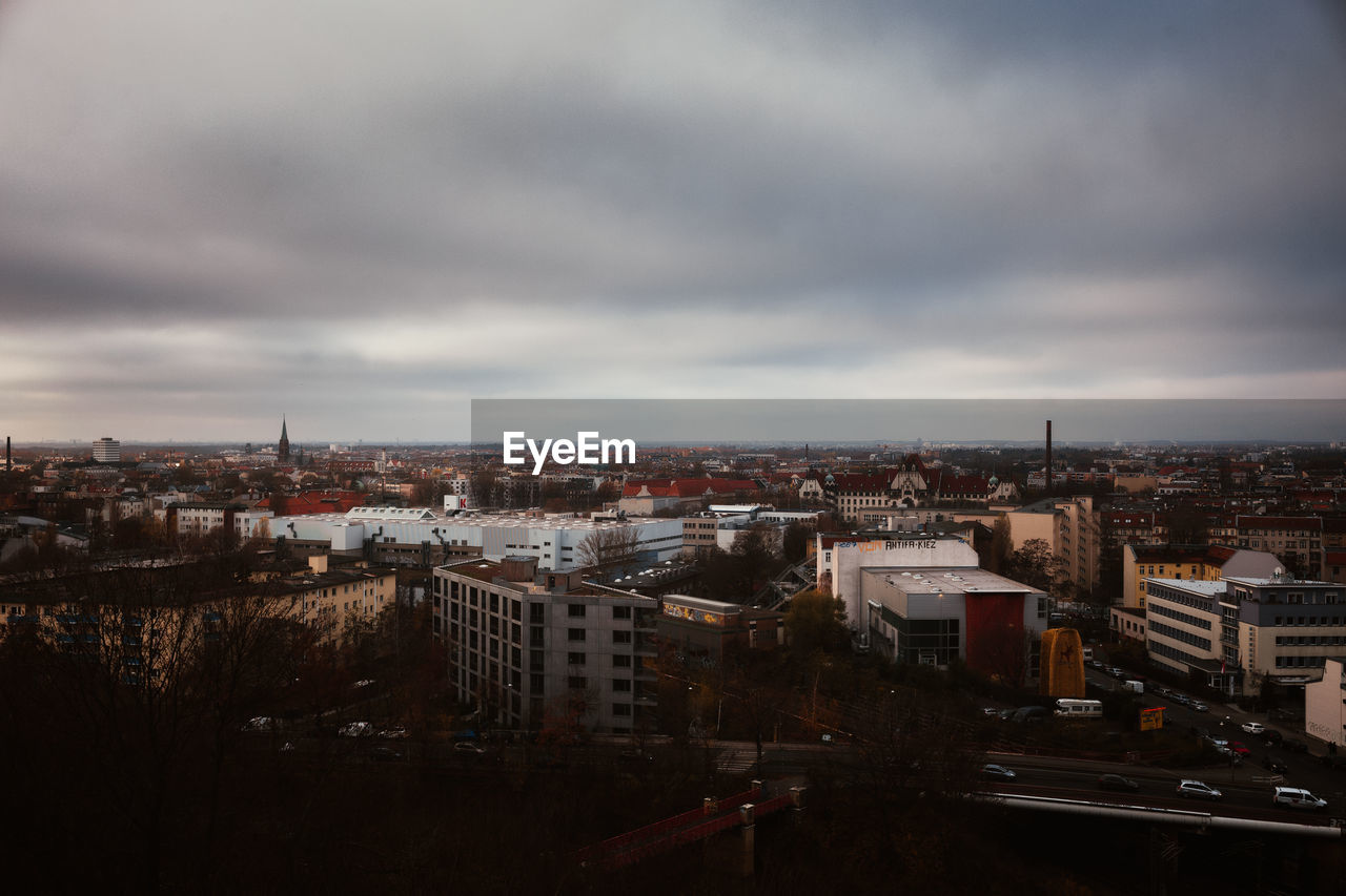 High angle view of buildings against sky at dusk