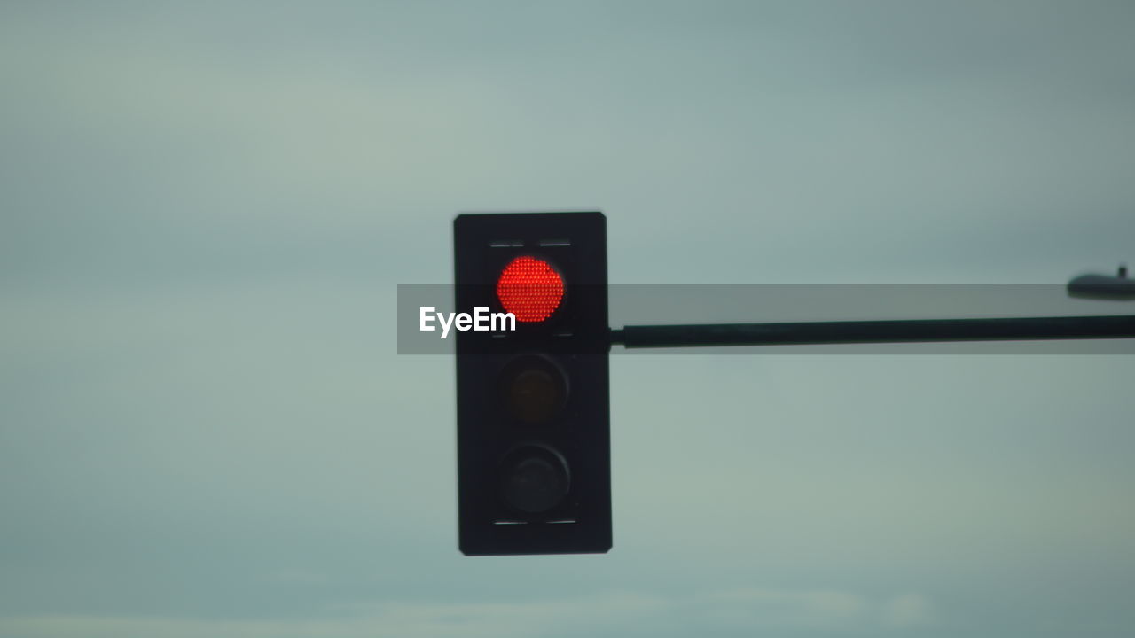 LOW ANGLE VIEW OF ROAD SIGNAL