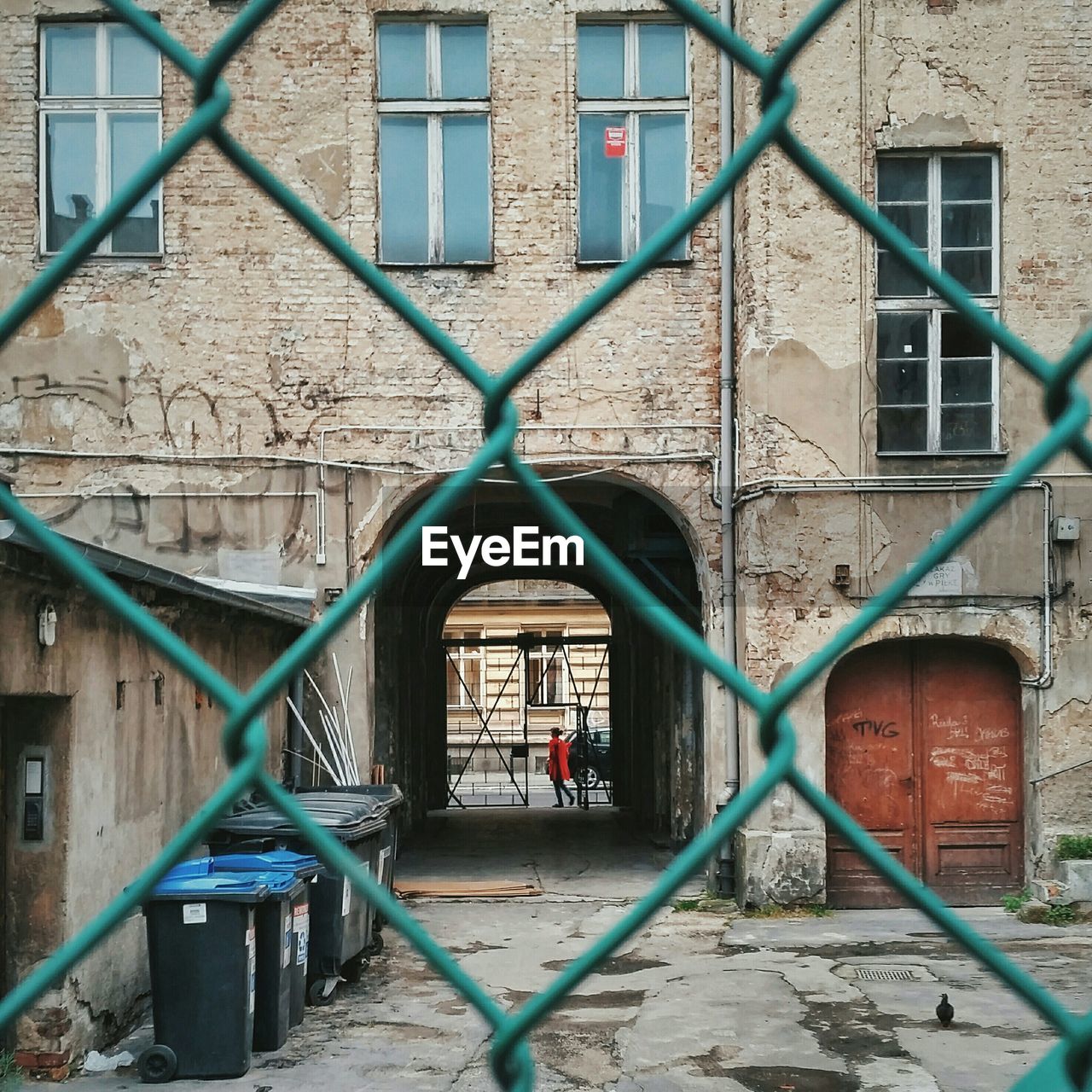 Building seen from chain link fence