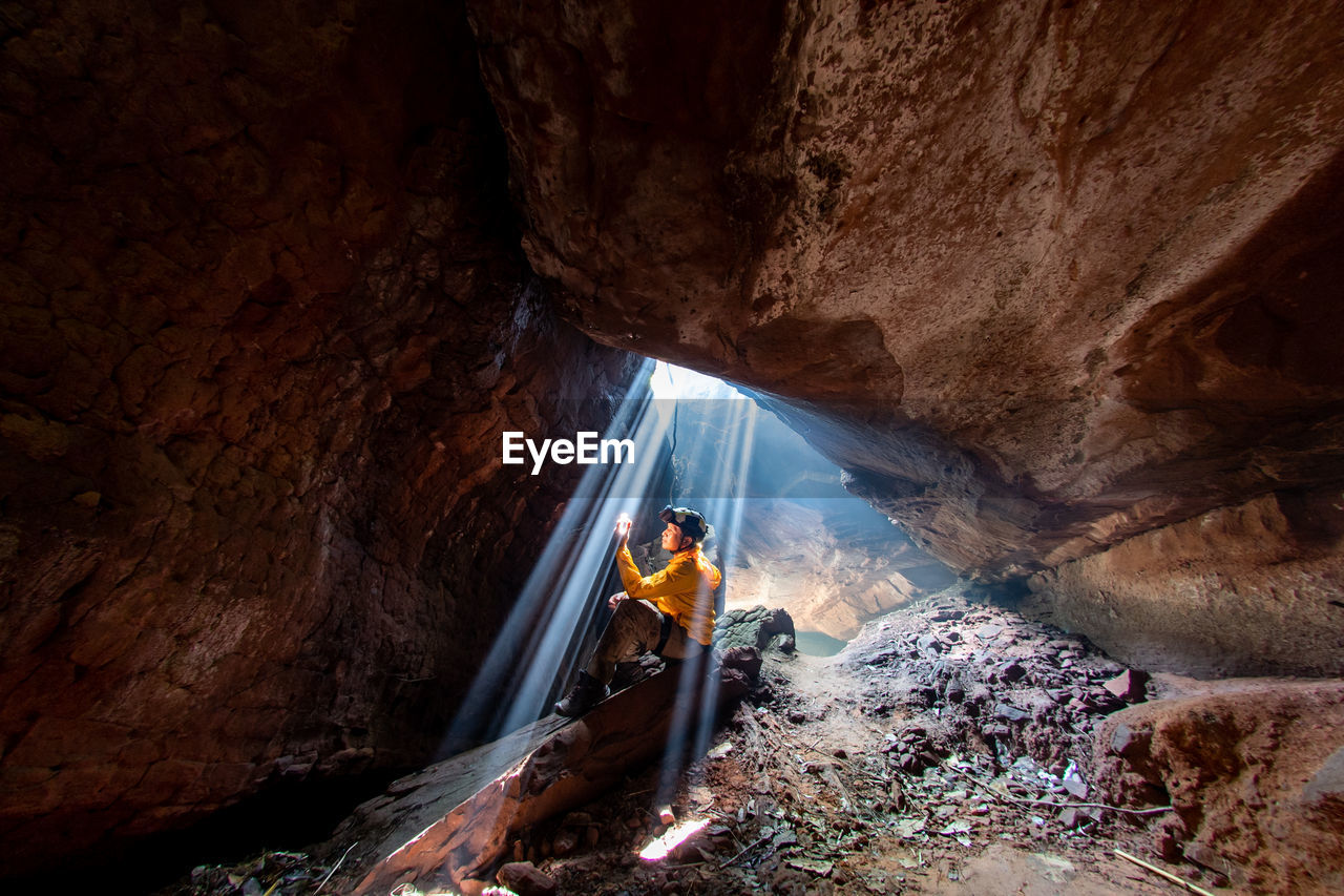 SCENIC VIEW OF CAVE AND ROCK