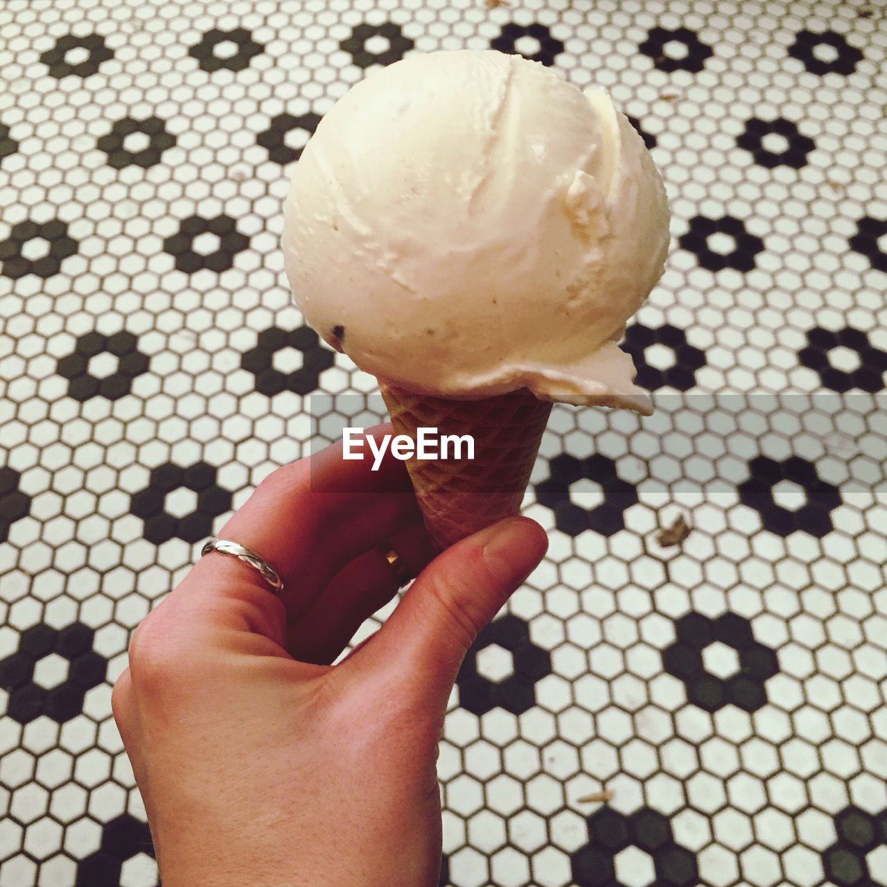 Woman holding ice cream cone