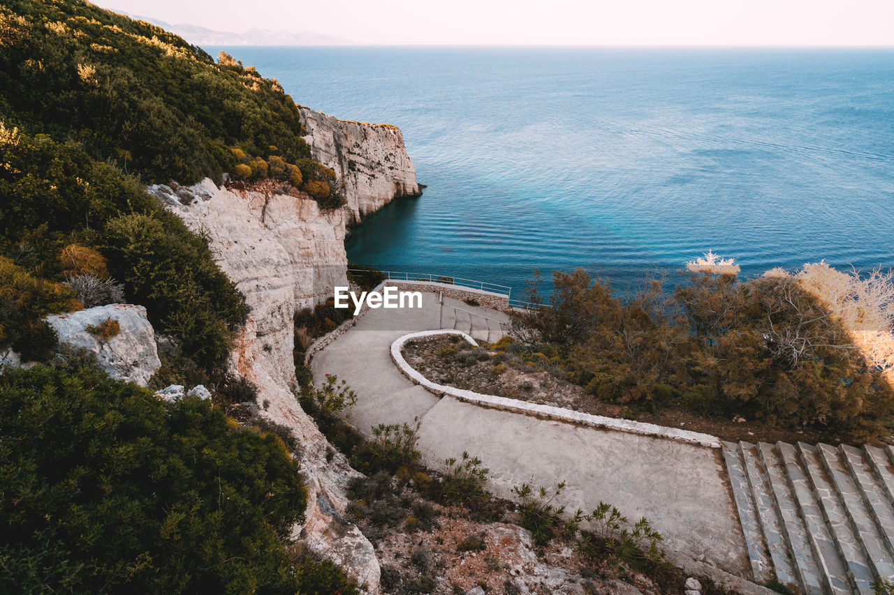 High angle view of plants by sea against sky