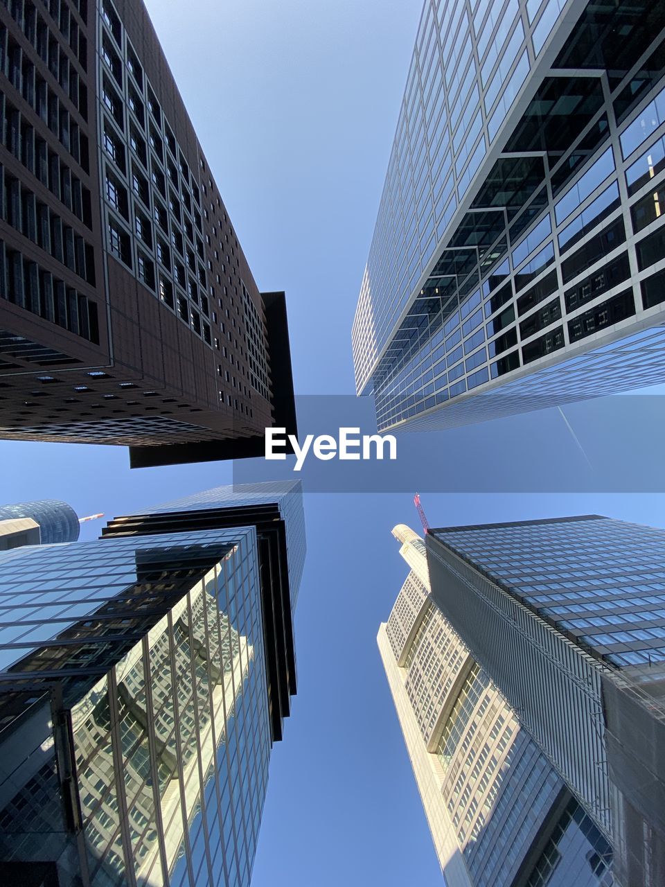 Low angle view of modern buildings against sky