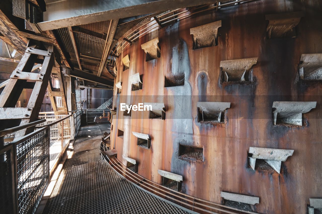 Rusty interior of abandoned factory building