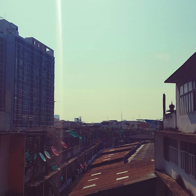 CITY BUILDINGS AGAINST SKY