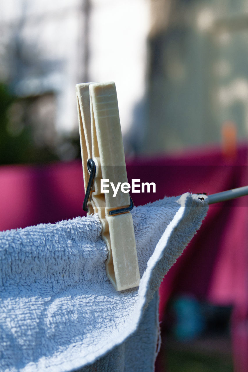 Close-up of clothespin on fabric