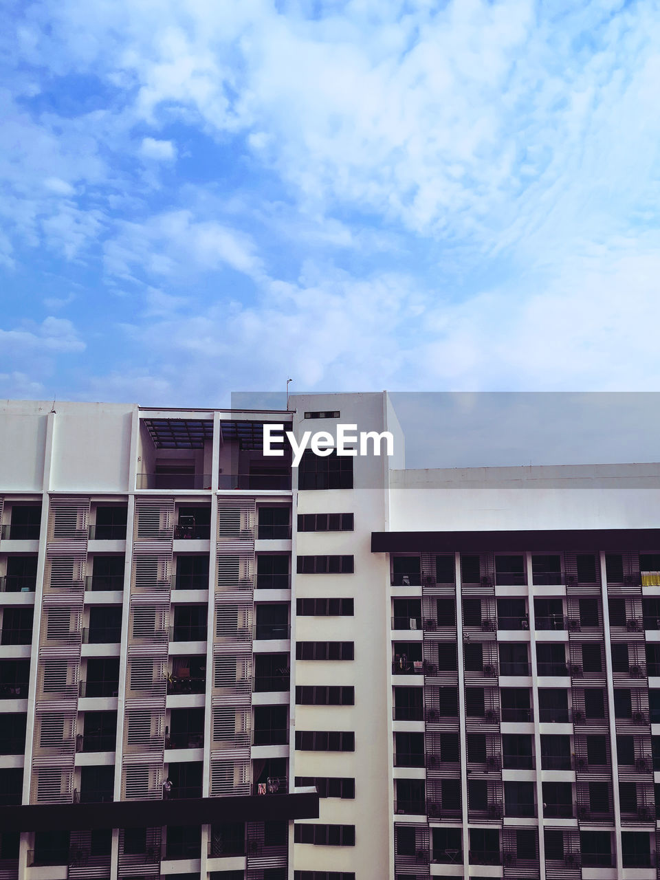 Low angle view of modern building against sky