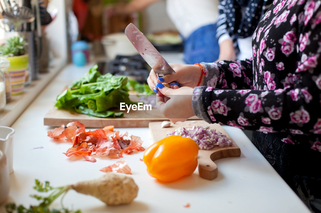 Close-up of hand preparing food