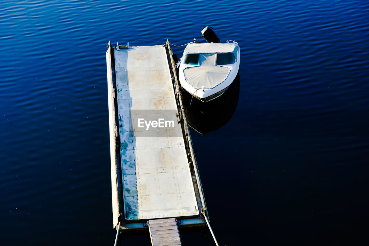 High angle view of boat moored on sea