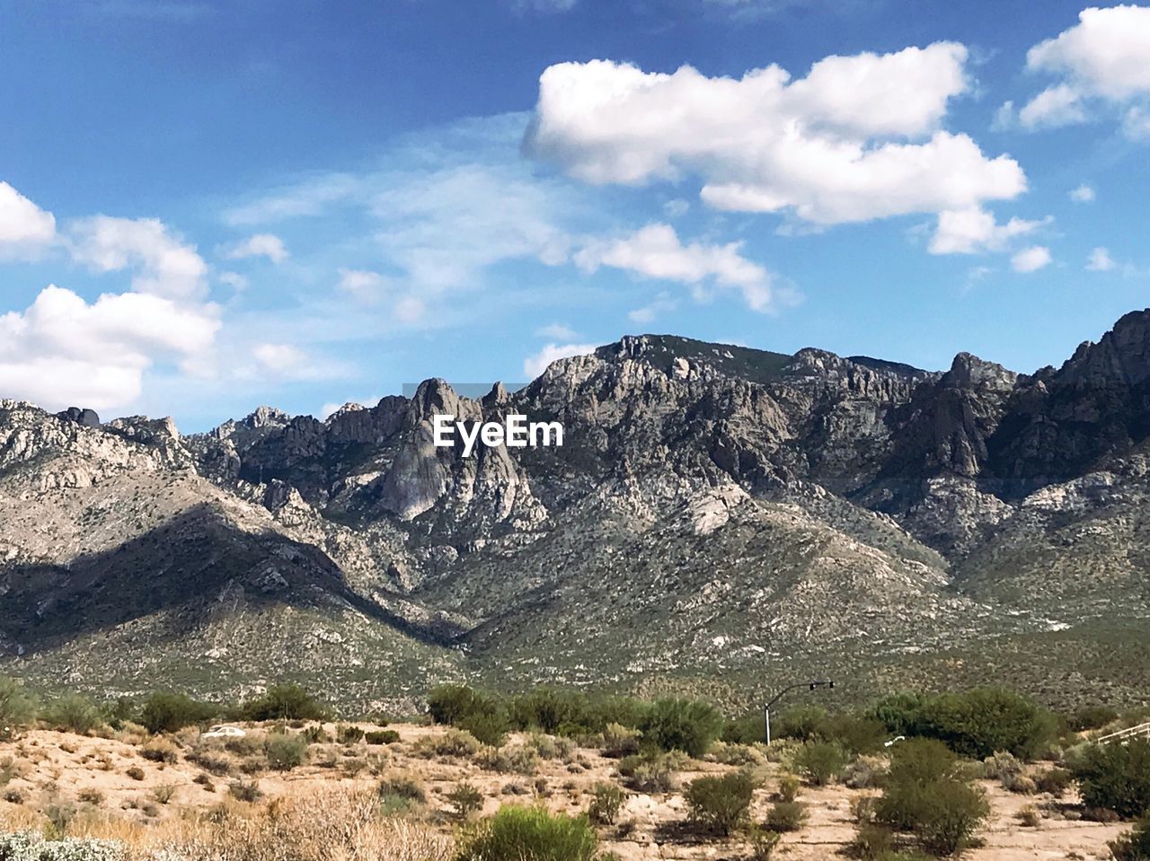 SCENIC VIEW OF ROCKS AGAINST SKY