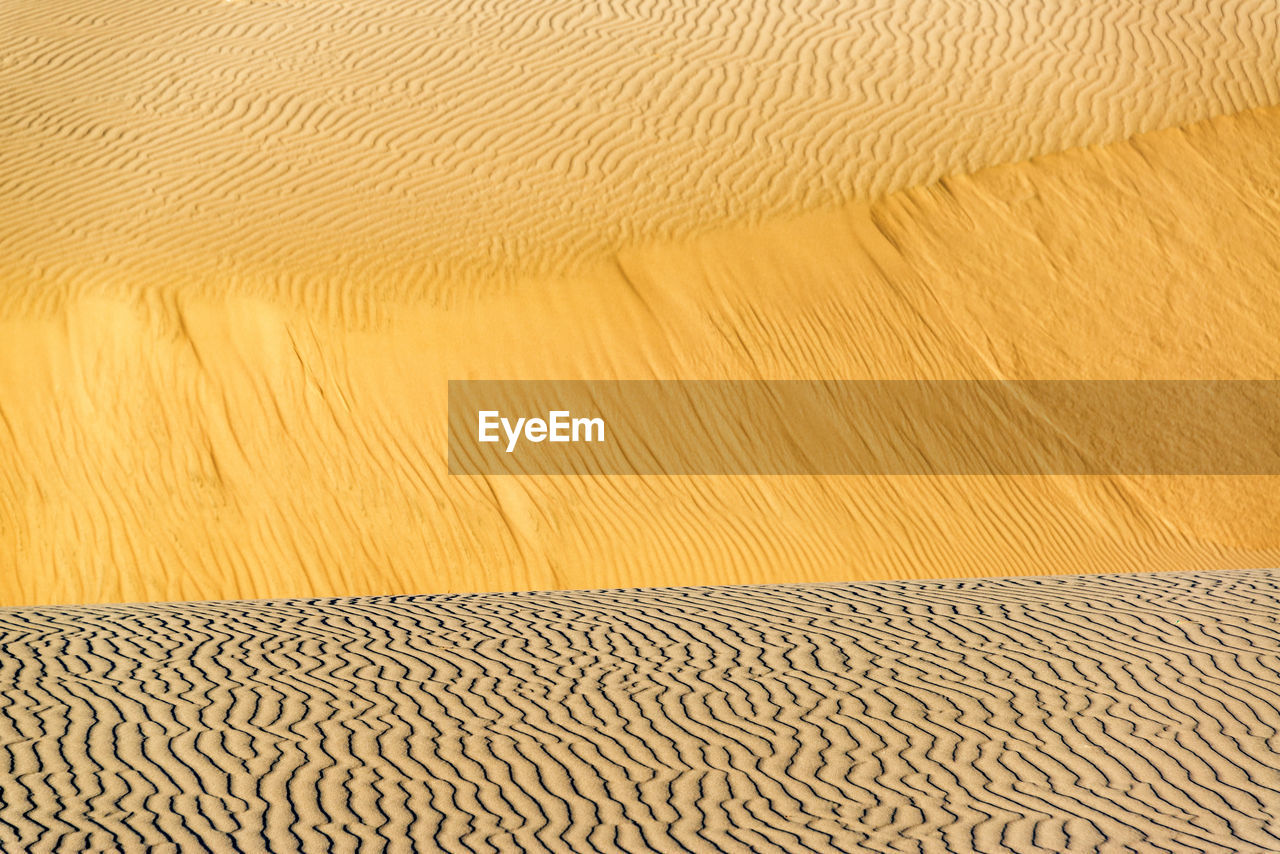 Sand dunes in desert at huacachina