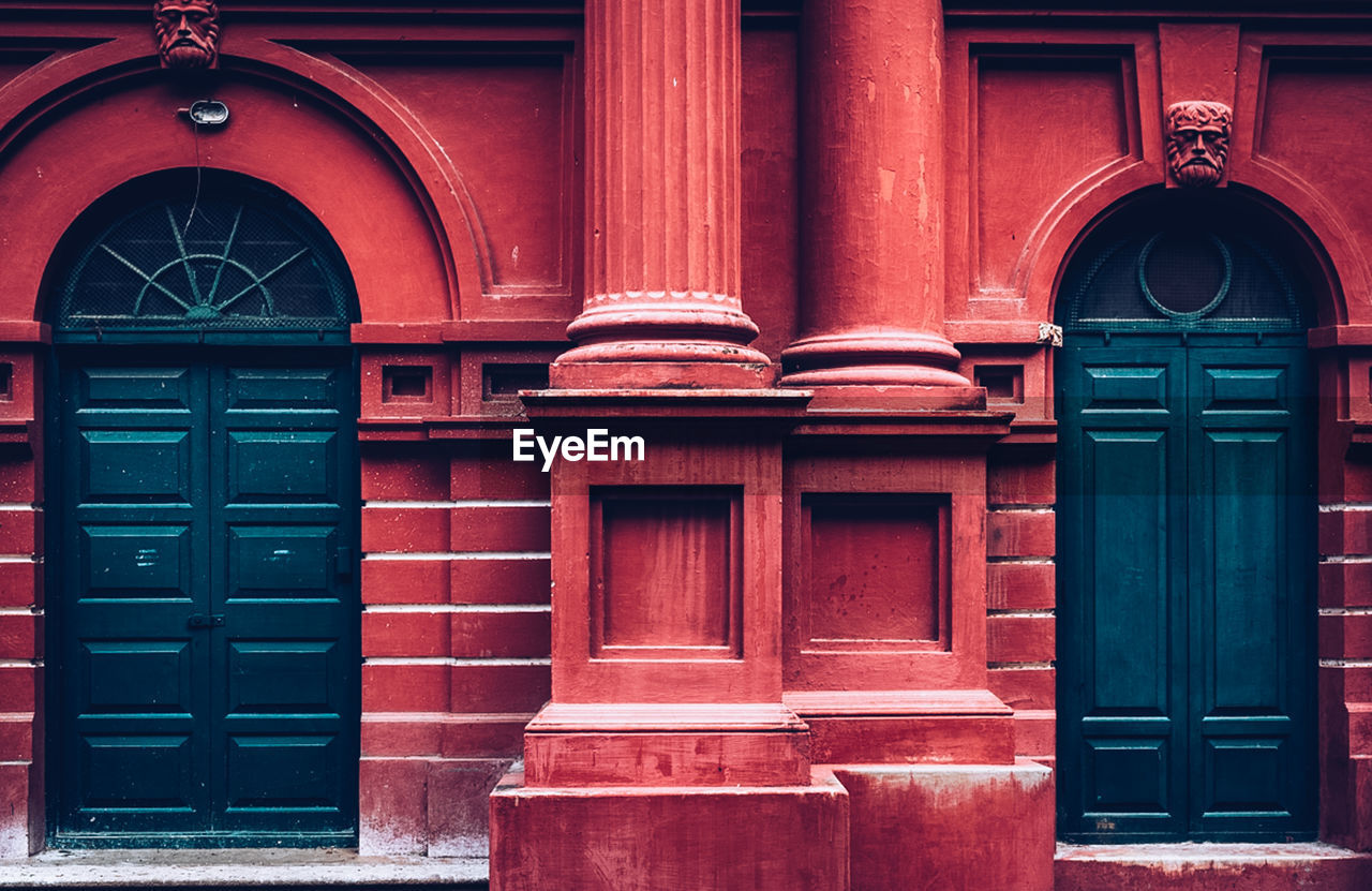 RED DOOR WITH BUILDING