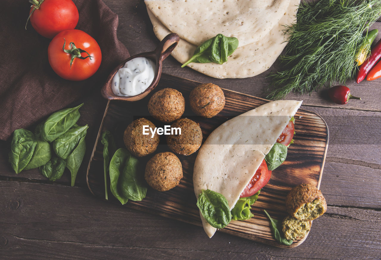 High angle view of food on cutting board over table