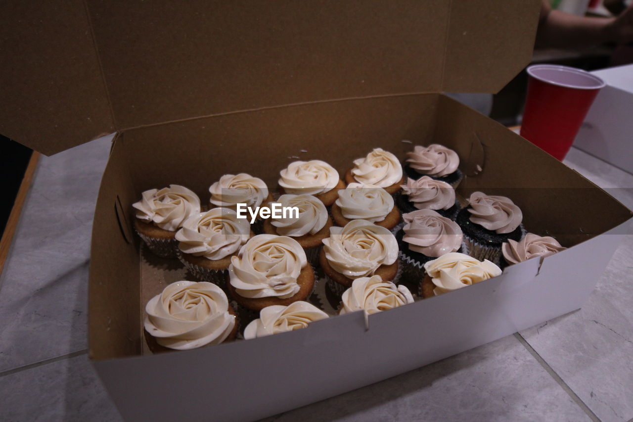 HIGH ANGLE VIEW OF VARIOUS FLOWER IN BOX