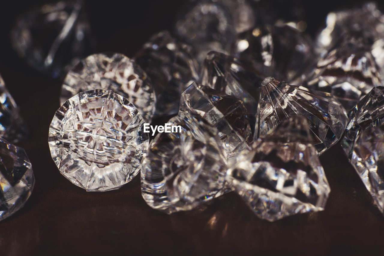 Close-up of diamonds on table 