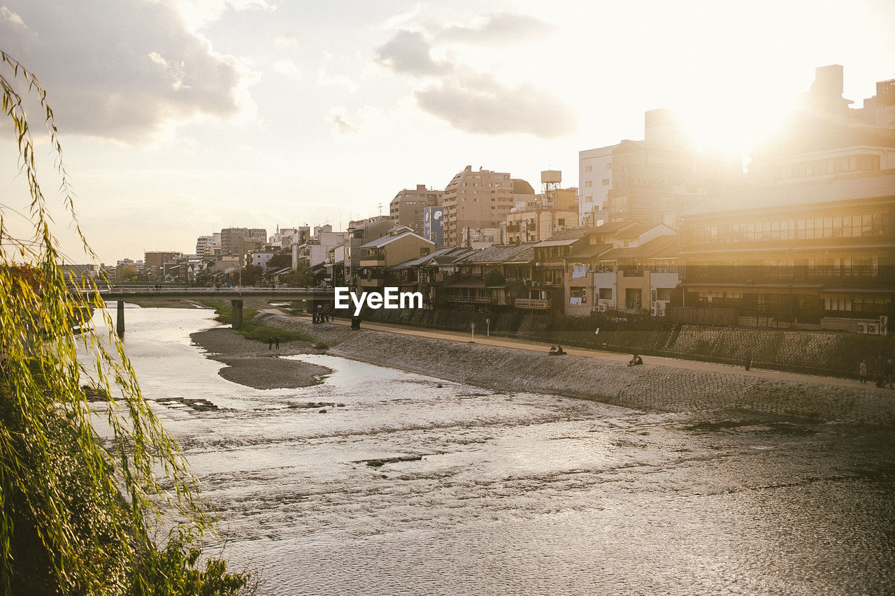 VIEW OF CITY AT SUNSET