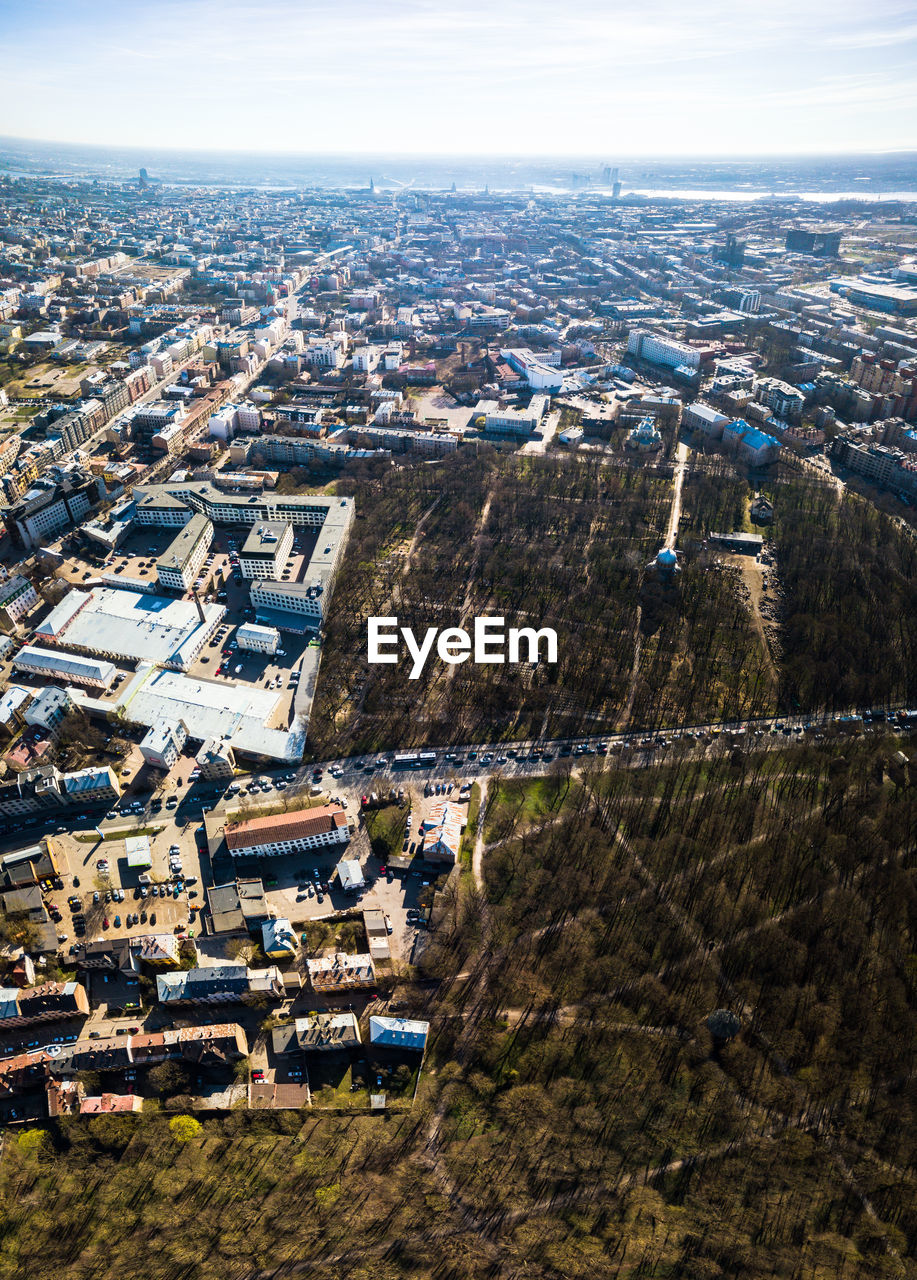 High angle view of buildings in city against sky