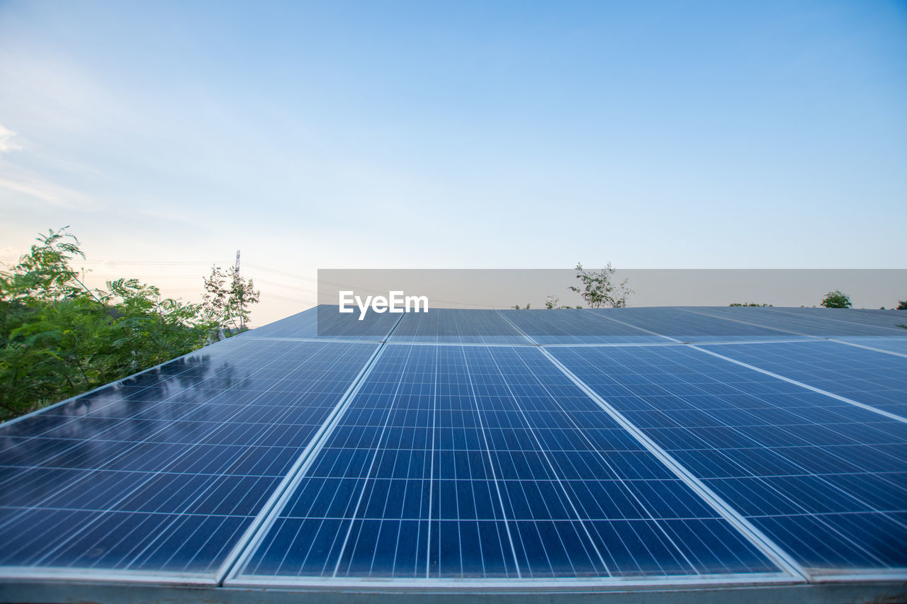 Solar panels against blue sky