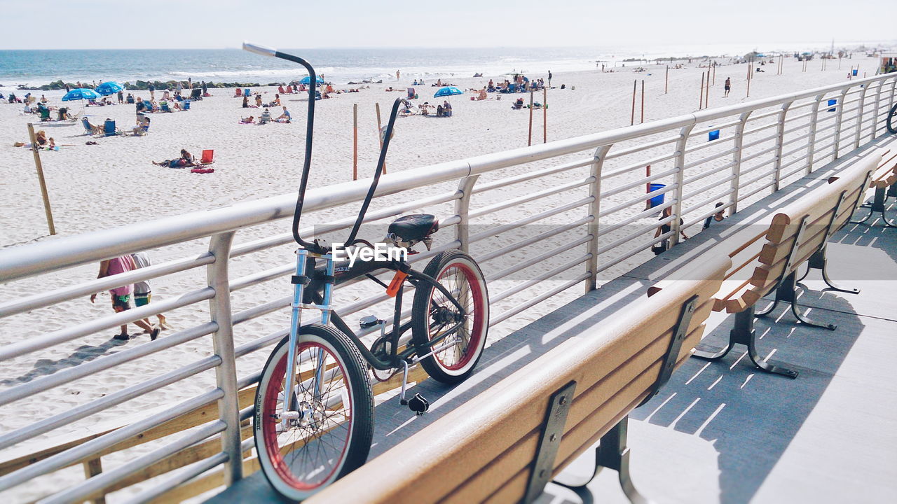 View of people and bike on beach