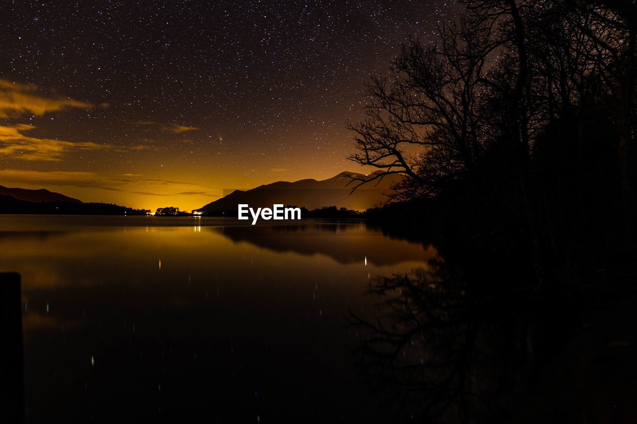 Derwent water at night from ashness jetty with reflections on the lake