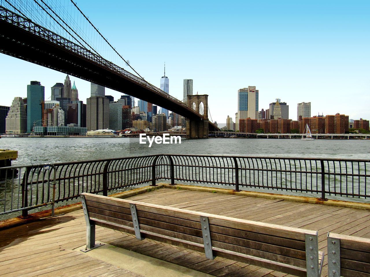 View of suspension bridge with city in background