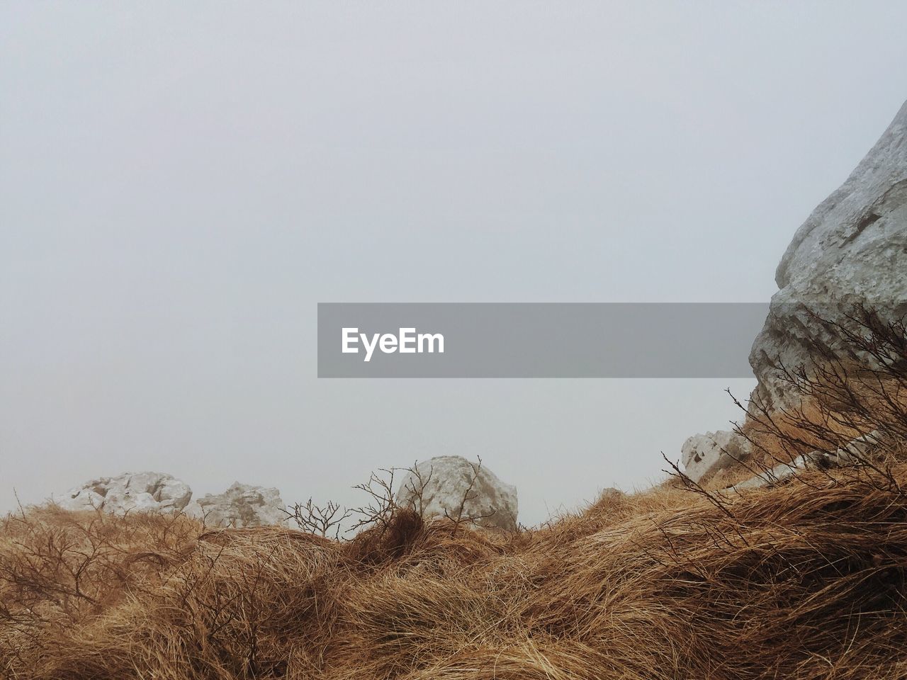 Low angle view of mountain against clear sky