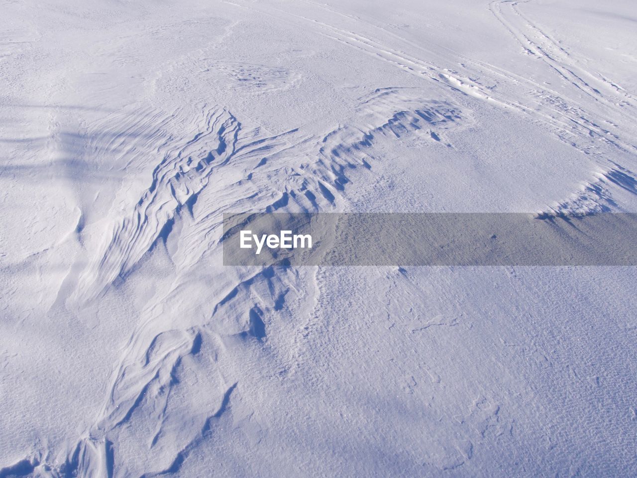 High angle view of snow covered land