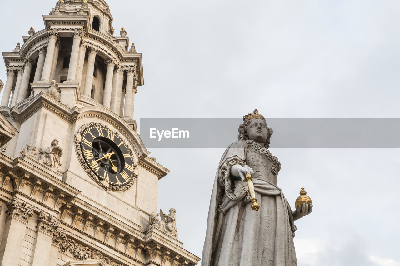 Low angle view of queen victoria statue in front of st pauls cathedral