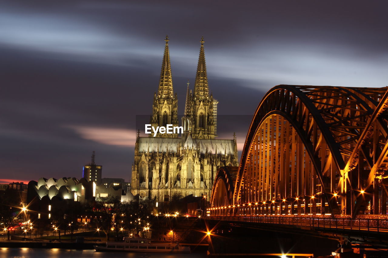 Low angle view of cologne city at night