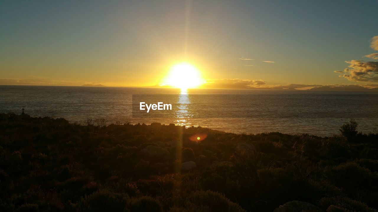 SUNSET OVER SEA