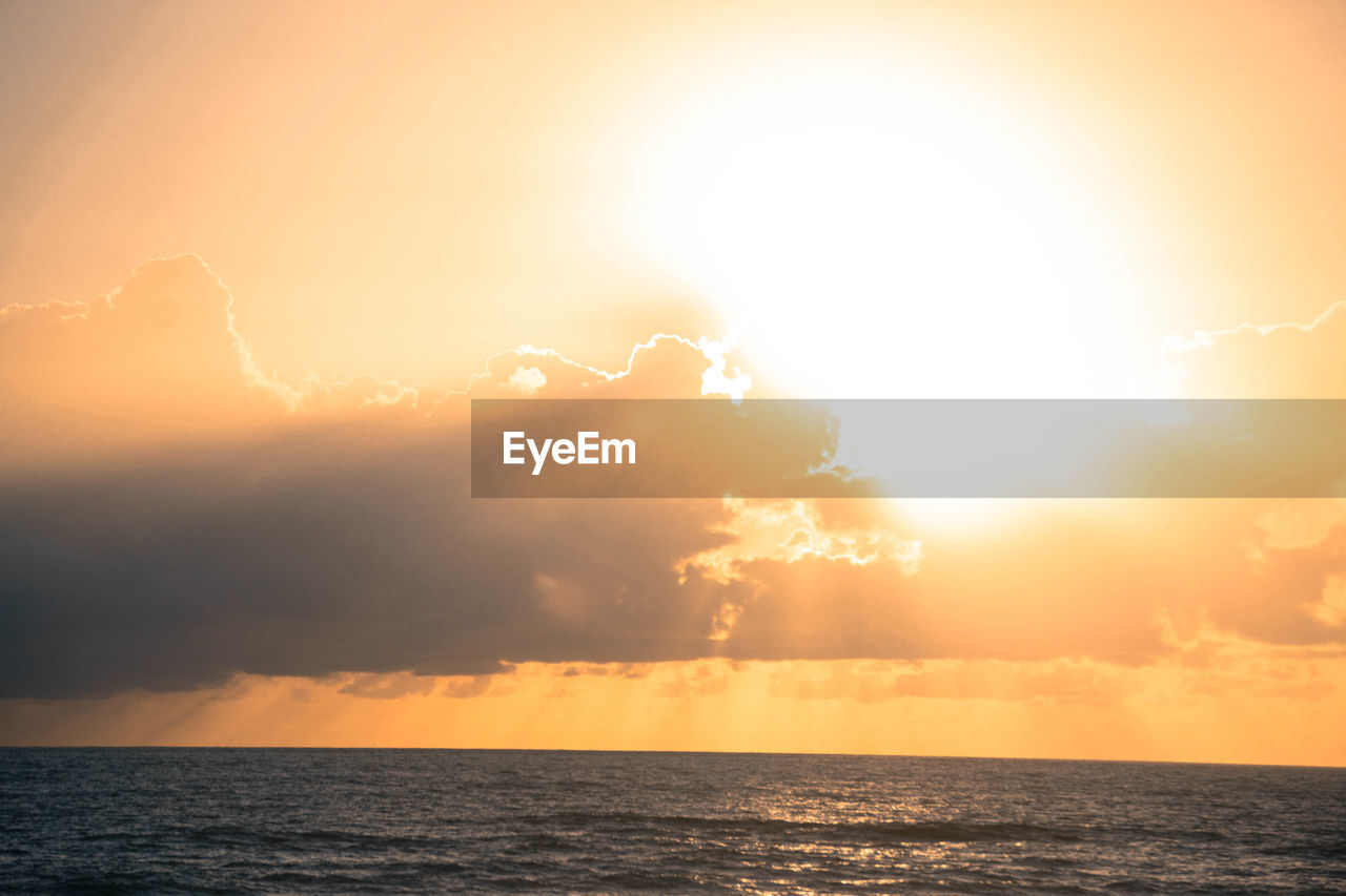 Scenic view of sea during sunset