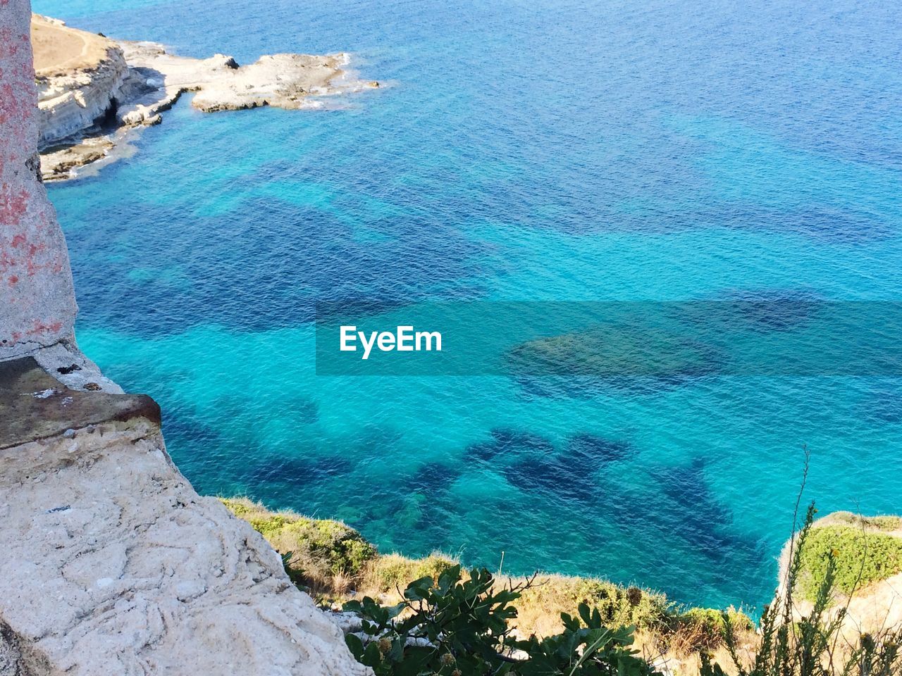 High angle view of beach against blue sky