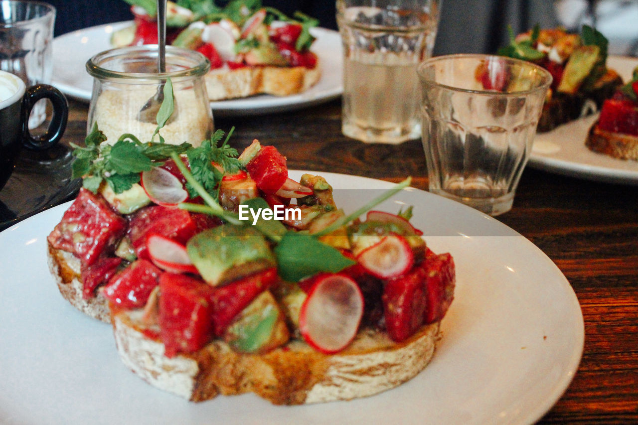 Close-up of open faced sandwich in plate