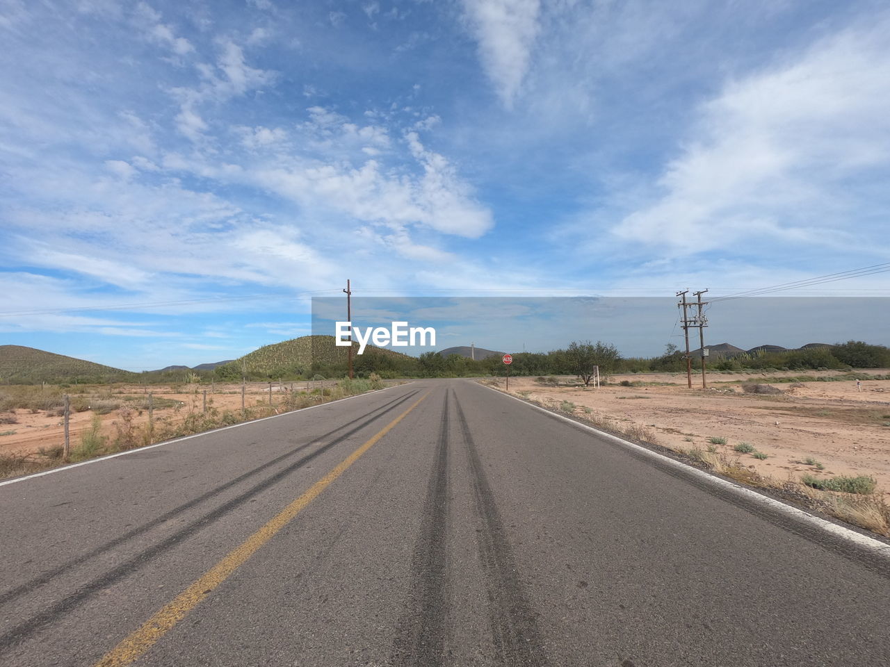 VIEW OF ROAD PASSING THROUGH LAND