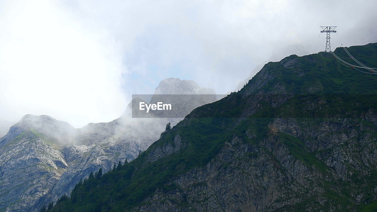LOW ANGLE VIEW OF MOUNTAIN AGAINST SKY