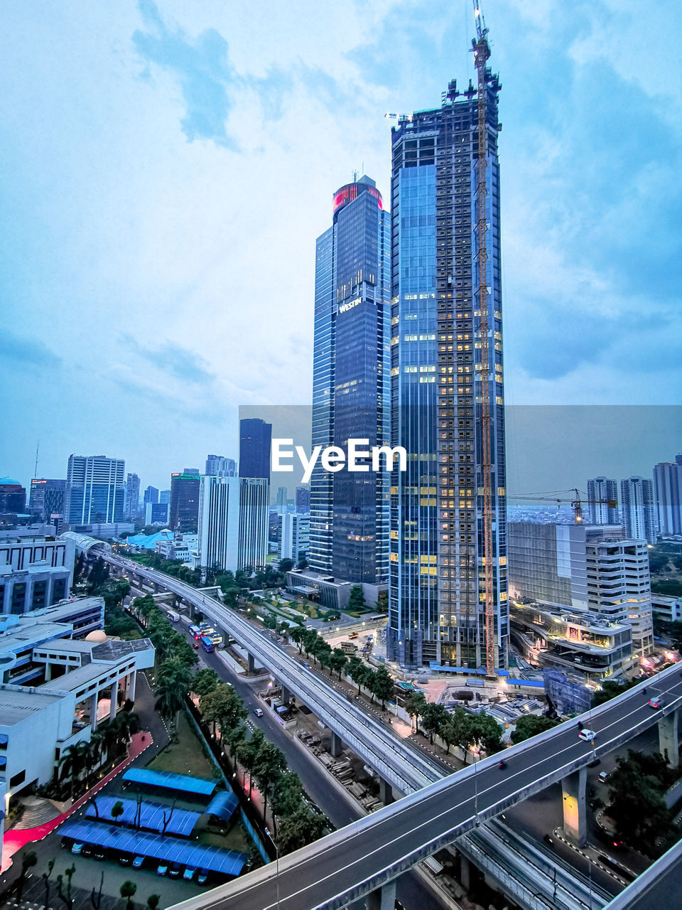 High angle view of buildings in city against sky