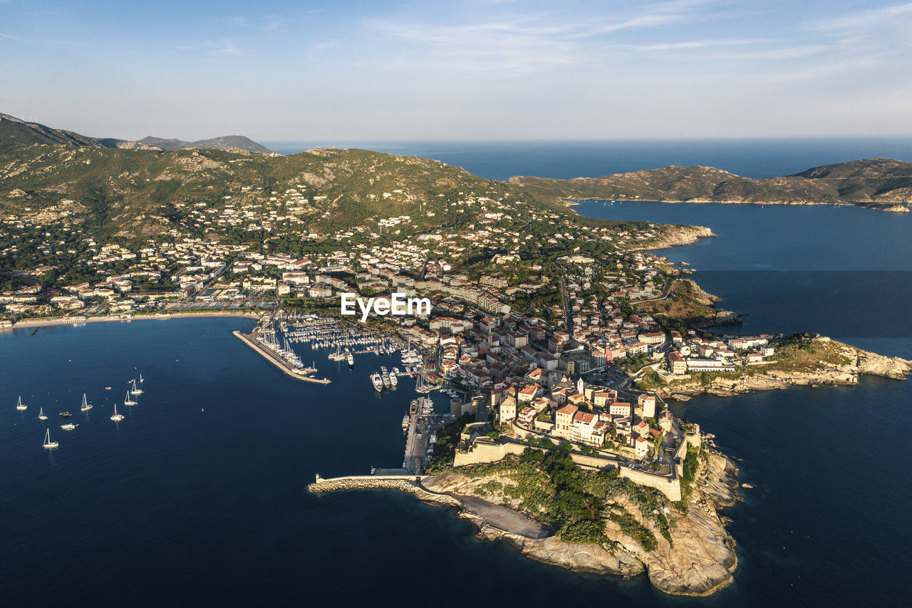 France, haute-corse, calvi, aerial view of town on shore of corsica island