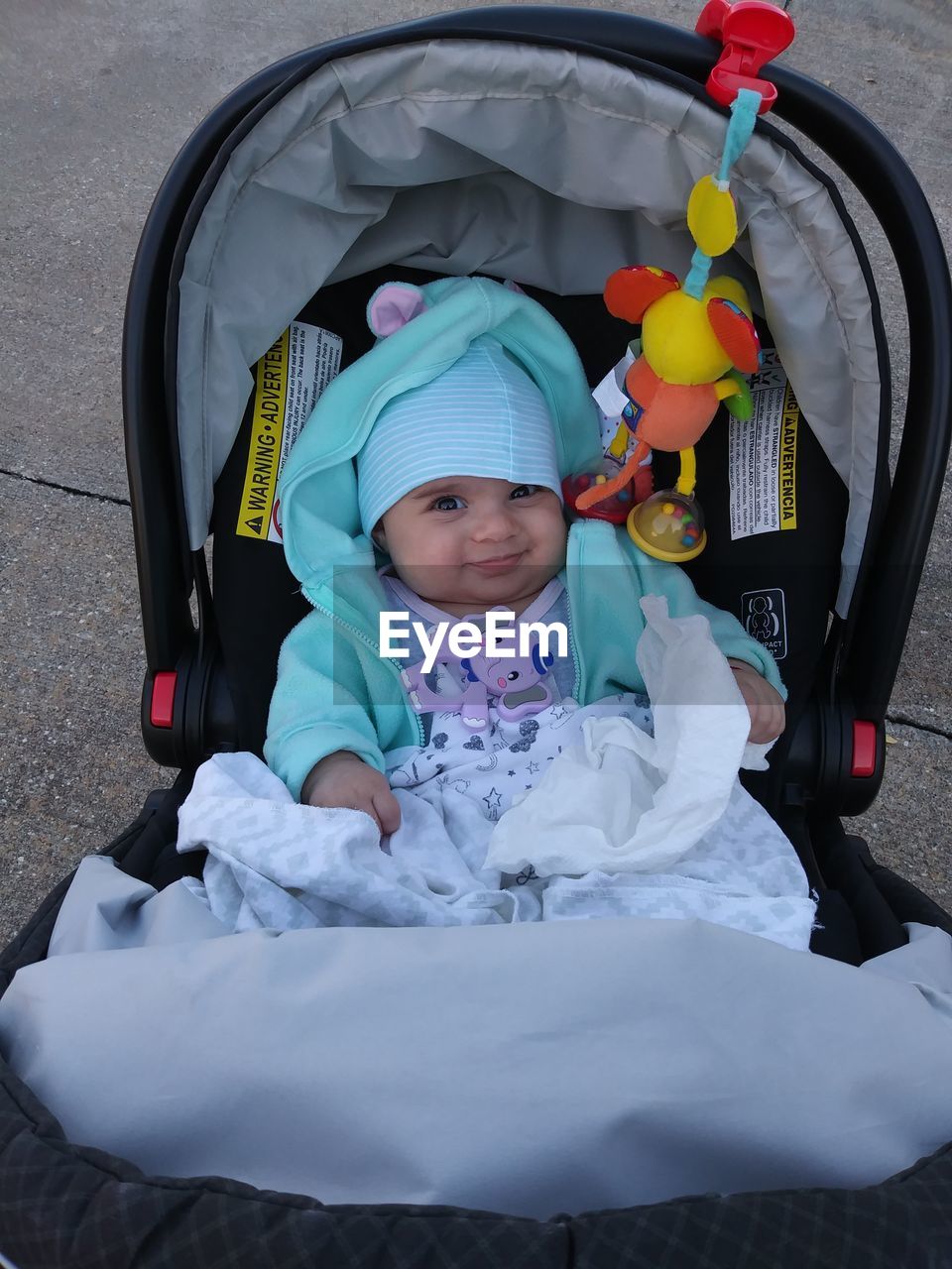 PORTRAIT OF CUTE BABY GIRL IN WINTER