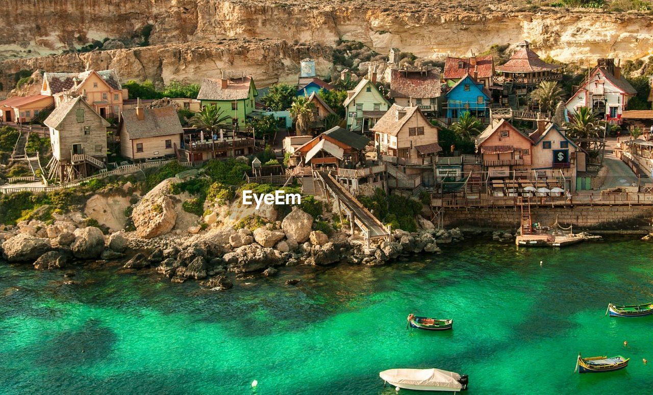 high angle view of buildings in water