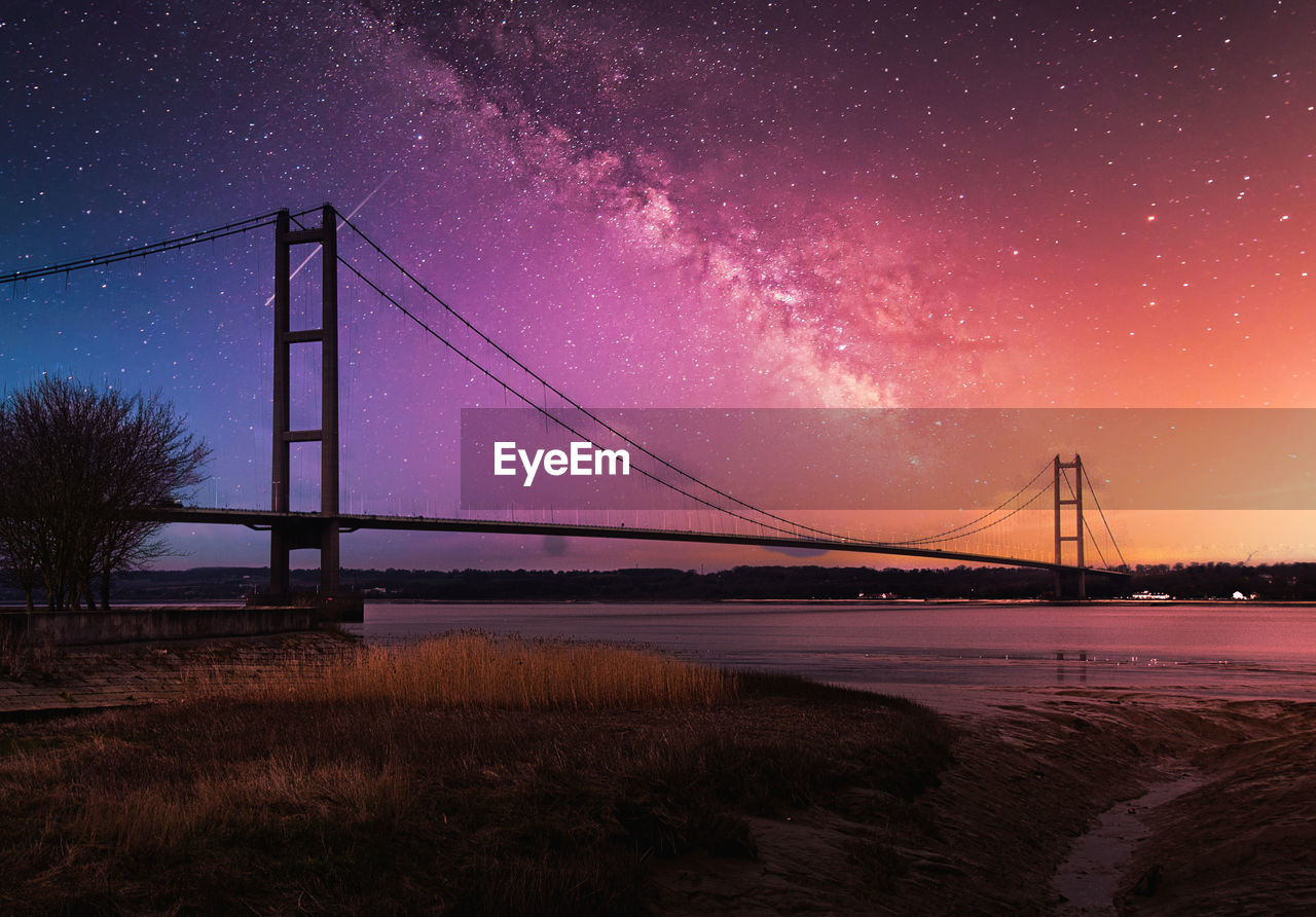 View of suspension bridge at night