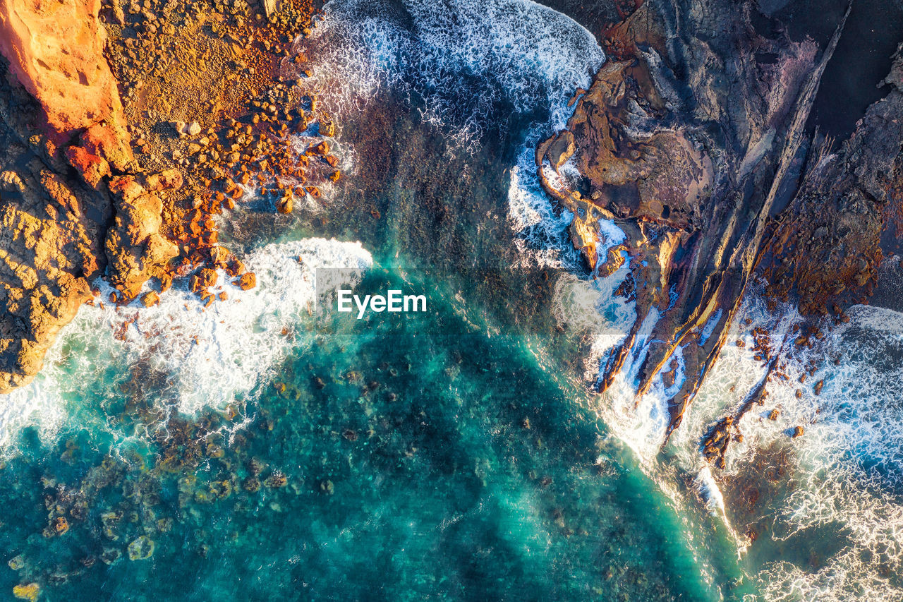 Full frame shot of rock in sea