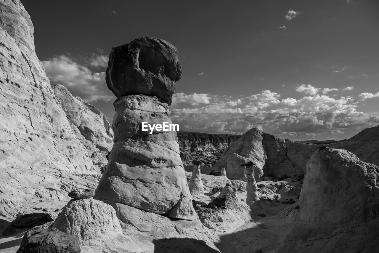 Scenic view of rock formations against sky