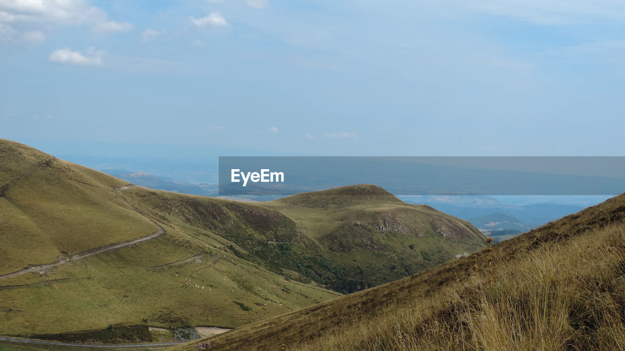 SCENIC VIEW OF MOUNTAIN AGAINST SKY