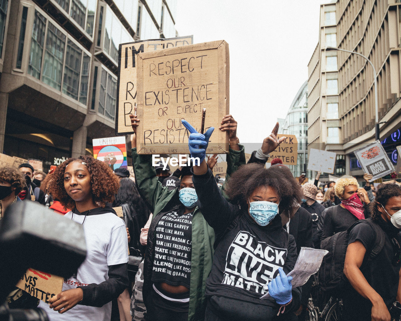 GROUP OF PEOPLE ON STREET