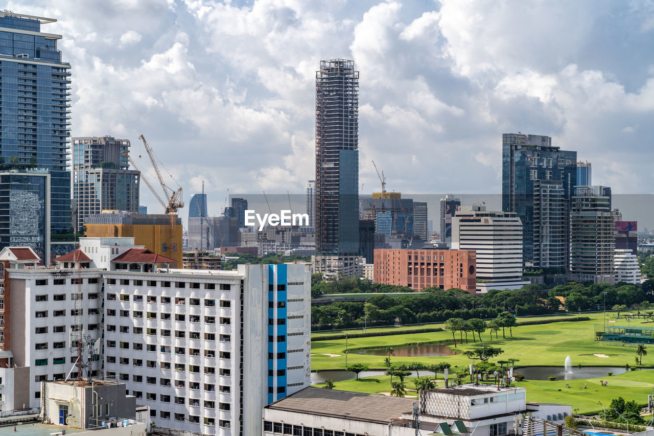 Bangkok, thailand - 12 august 2022 - view of bangkok cityscape high-rises and bts skytrains
