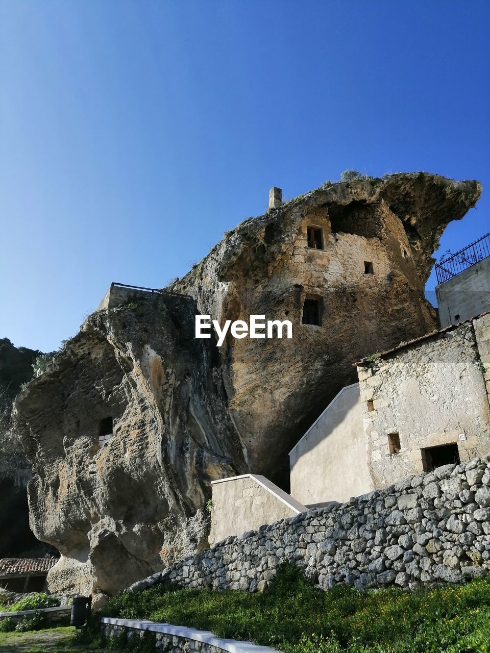 Low angle view of fort against blue sky