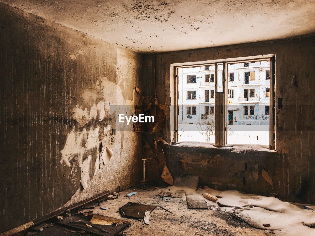 WINDOW OF ABANDONED BUILDING